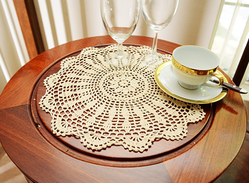 crochet round placemat. 16" round. wheat color. 2 pieces set